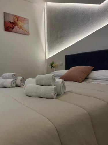 Ένα ή περισσότερα κρεβάτια σε δωμάτιο στο Maresia Apartment