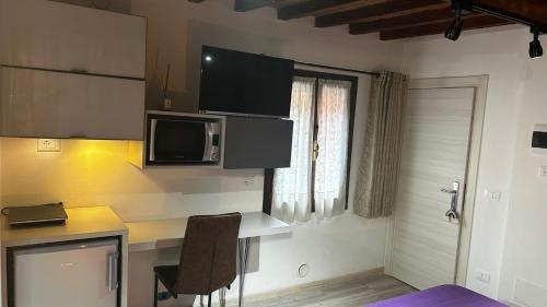 A kitchen or kitchenette at Smartroom LuLa