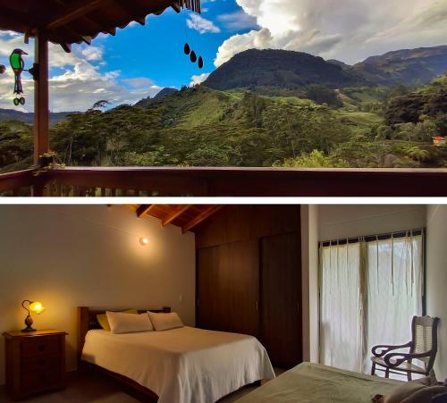 a bedroom with a view of a mountain at La Casa Del Sol in Jardin