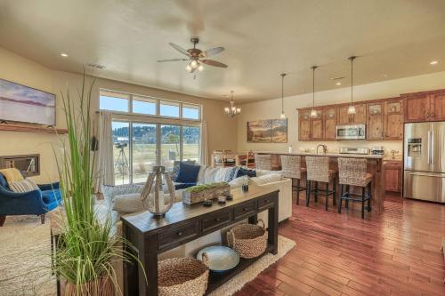 a kitchen and living room with a couch and a table at 10 Cobblestone Ln in Pagosa Springs