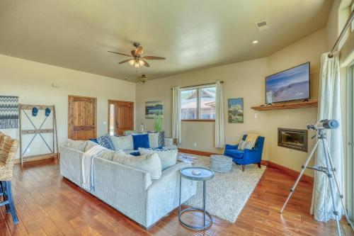 a living room with a couch and a ceiling fan at 10 Cobblestone Ln in Pagosa Springs