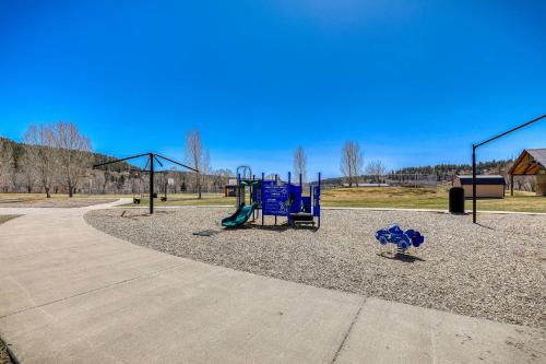 a park with a playground with two swings at 10 Cobblestone Ln in Pagosa Springs