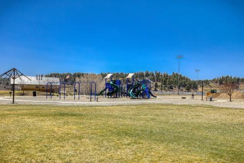 a playground in a park with a grass field at 10 Cobblestone Ln in Pagosa Springs