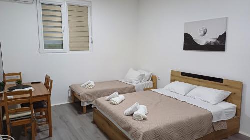 Llit o llits en una habitació de TVIS studios