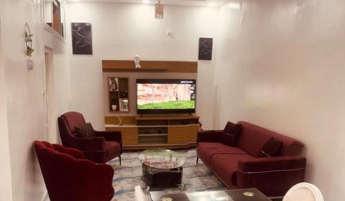 Телевизор и/или развлекательный центр в Appartement chic Hypercentre Yaoundé
