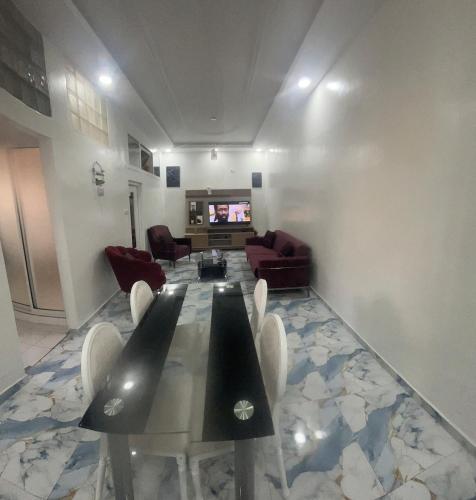 Гостиная зона в Appartement chic Hypercentre Yaoundé
