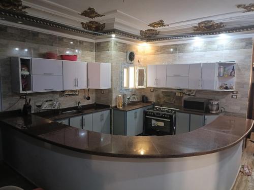 Η κουζίνα ή μικρή κουζίνα στο Al Rum Al Rum Street in front of Freedom Private School