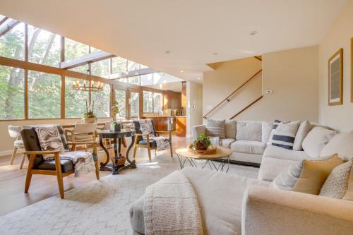 a living room with a couch and a table at Walk to Lake Arrowhead Village Gem with Lake Access in Lake Arrowhead