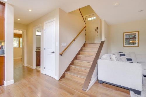 a living room with a staircase and a white couch at Walk to Lake Arrowhead Village Gem with Lake Access in Lake Arrowhead