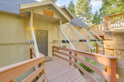 a wooden staircase leading to a house with a porch at Walk to Lake Arrowhead Village Gem with Lake Access in Lake Arrowhead