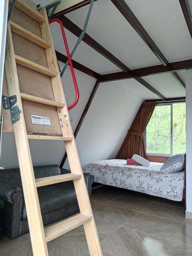 Кровать или кровати в номере Hospedaje Rural La Fortaleza