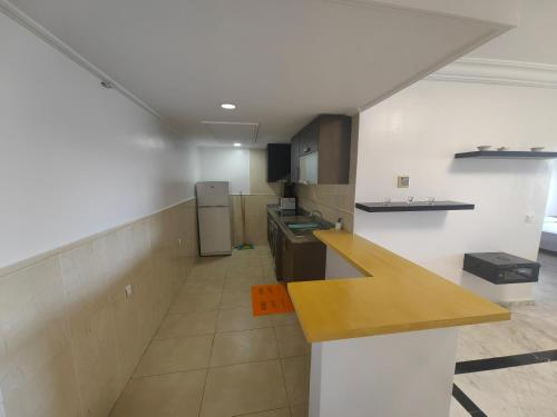 a kitchen with a counter and a counter top at City Bleu Maroc in Tangier