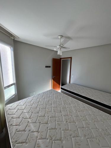 Postel nebo postele na pokoji v ubytování Lumar Apartamento em praia do morro