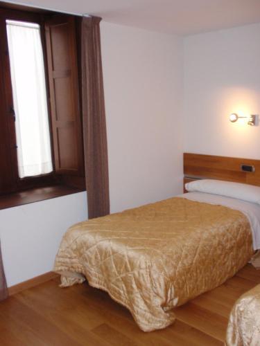 Postel nebo postele na pokoji v ubytování Posada Miranda