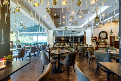 En restaurant eller et andet spisested på Mesón Ejecutivo Guadalajara Minerva - Av México