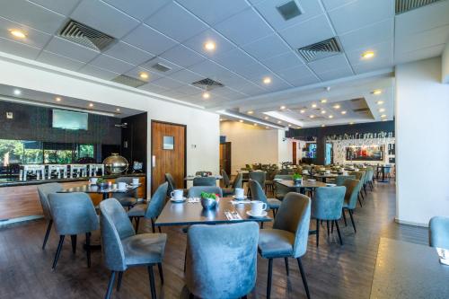 En restaurant eller et andet spisested på Mesón Ejecutivo Guadalajara Minerva - Av México