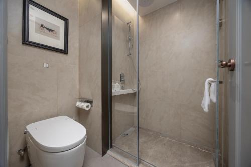Ένα μπάνιο στο Vienna International Hotel Beijing Jinsong Shuangjing Subway Station Branch