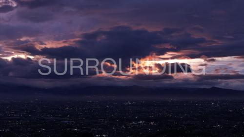a stormy sky with the word sunrise in the clouds at Rumah Lereng Bandung in Bandung