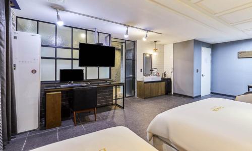 Ένα ή περισσότερα κρεβάτια σε δωμάτιο στο HOTEL bonito