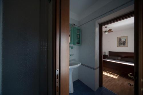 a bathroom with a toilet and a sink at La Pioppa Agriturismo in Sacile