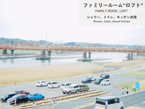 a poster of a highway with cars and a bridge at HIKE in Tamana