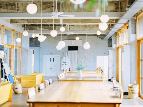 a conference room with a long table and chairs at HIKE in Tamana