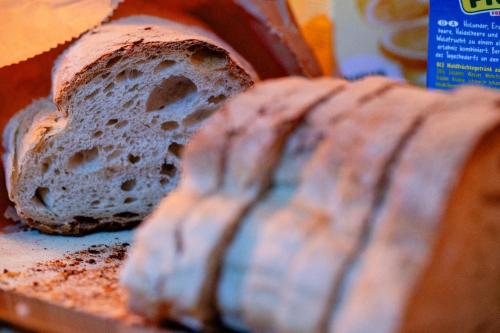 a close up of a loaf of bread on a plate at Casa Martini in Rome