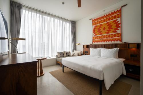 Postel nebo postele na pokoji v ubytování Granbell Hotel Colombo