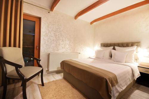 Giường trong phòng chung tại Complex Turistic Creanga Resort & Spa