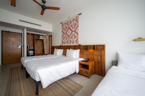 Postel nebo postele na pokoji v ubytování Granbell Hotel Colombo