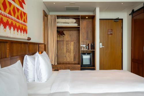 Postel nebo postele na pokoji v ubytování Granbell Hotel Colombo