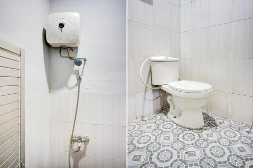 Pulauberayan DadapDancenter Pancing Near Universitas Negeri Medan UNIMED Formerly Nadira Homestay的带马桶和淋浴的浴室