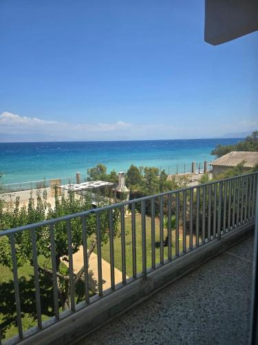 a view of the ocean from a balcony at Beachfront Bliss Oasis in Melission