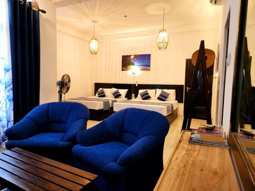 Postel nebo postele na pokoji v ubytování Sun sea guest home