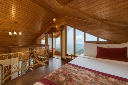 Postel nebo postele na pokoji v ubytování Summit Grace Boutique Hotel & Spa