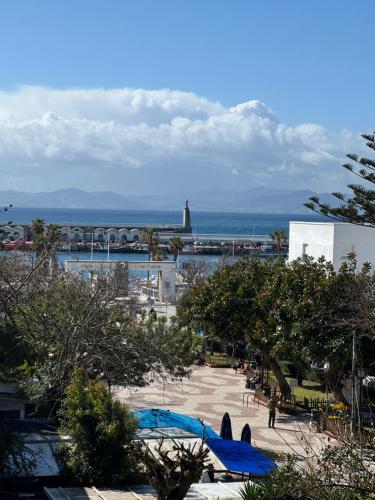 a view of a city with the ocean in the background at Estudio 1 Café Bernal in Tarifa