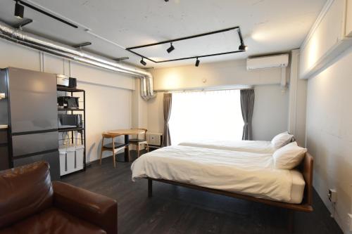 Un pat sau paturi într-o cameră la NIYS apartments 37type
