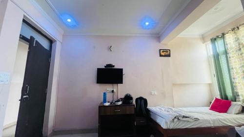 TV a/nebo společenská místnost v ubytování Hotel Bullet Inn