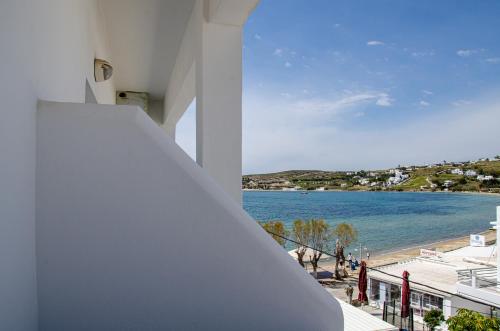 a view of the beach from the balcony of a building at Hotel Livadia in Parikia