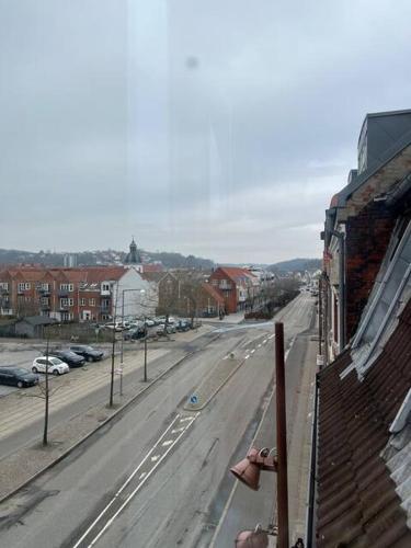 a view of a city street from a building at Central og rummelig lejlighed i Vejle in Vejle