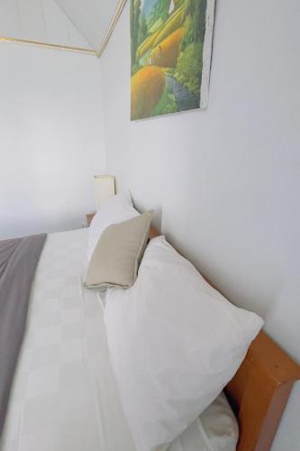 Letto o letti in una camera di The Iris Kintamani