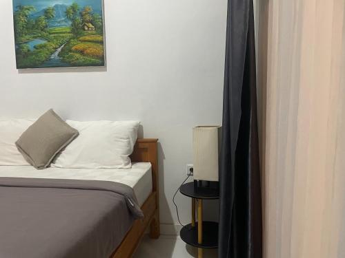 Letto o letti in una camera di The Iris Kintamani