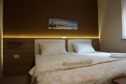 Katil atau katil-katil dalam bilik di Rooms and Apartment Soča Kobarid