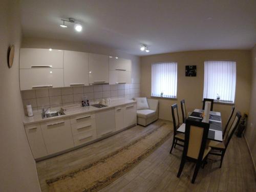 Kuchyň nebo kuchyňský kout v ubytování Rooms and Apartment Soča Kobarid