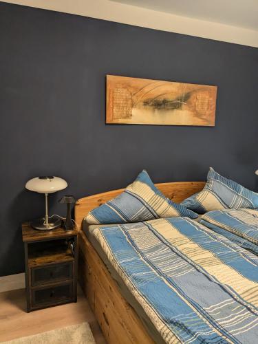 two beds sitting next to each other in a bedroom at Ferienhaus Merl in Zell an der Mosel