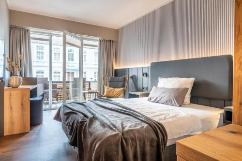 Arthotel Bakkerにあるベッド