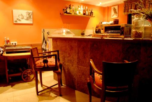 Reštaurácia alebo iné gastronomické zariadenie v ubytovaní Petit Hotel