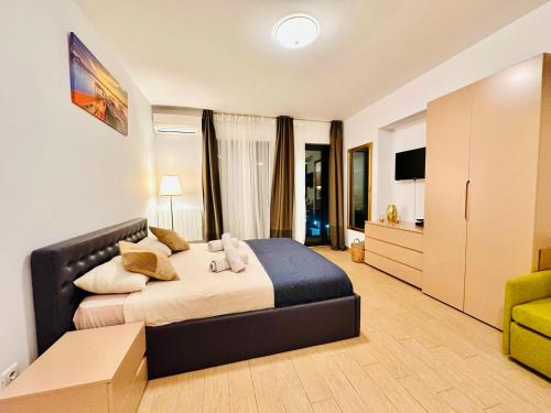 TV/trung tâm giải trí tại Beachside Studio