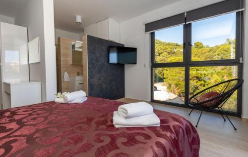 Voodi või voodid majutusasutuse Villa Mara in Komarna by Villas Guide toas