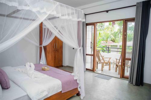 Postel nebo postele na pokoji v ubytování Hirigala Beach Resort